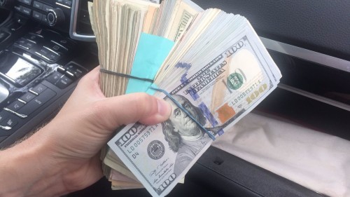 sd-me-glovebox-cash-20170727.jpg